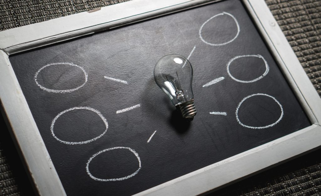 black board with a light bulb